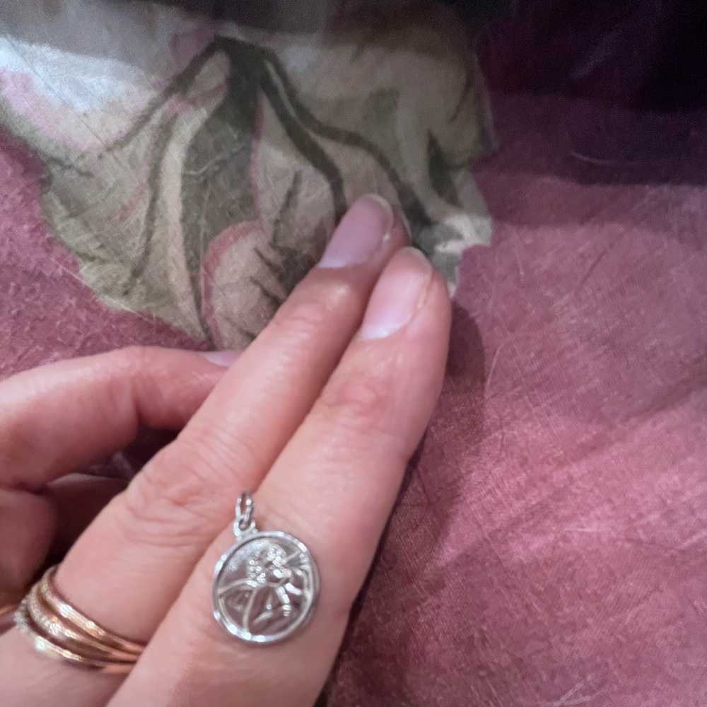 14 k saro marked white gold cherub charm- guardian angel.